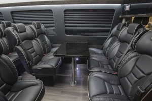 Custom Bus, Van and Shuttle Seating in Black Leather with White Accent Stitching