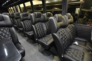 Custom Built Bus Seating in Black Leather with Diamond Inlay and Accent Stitching