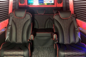 Black and Red Seating Sprinter Van